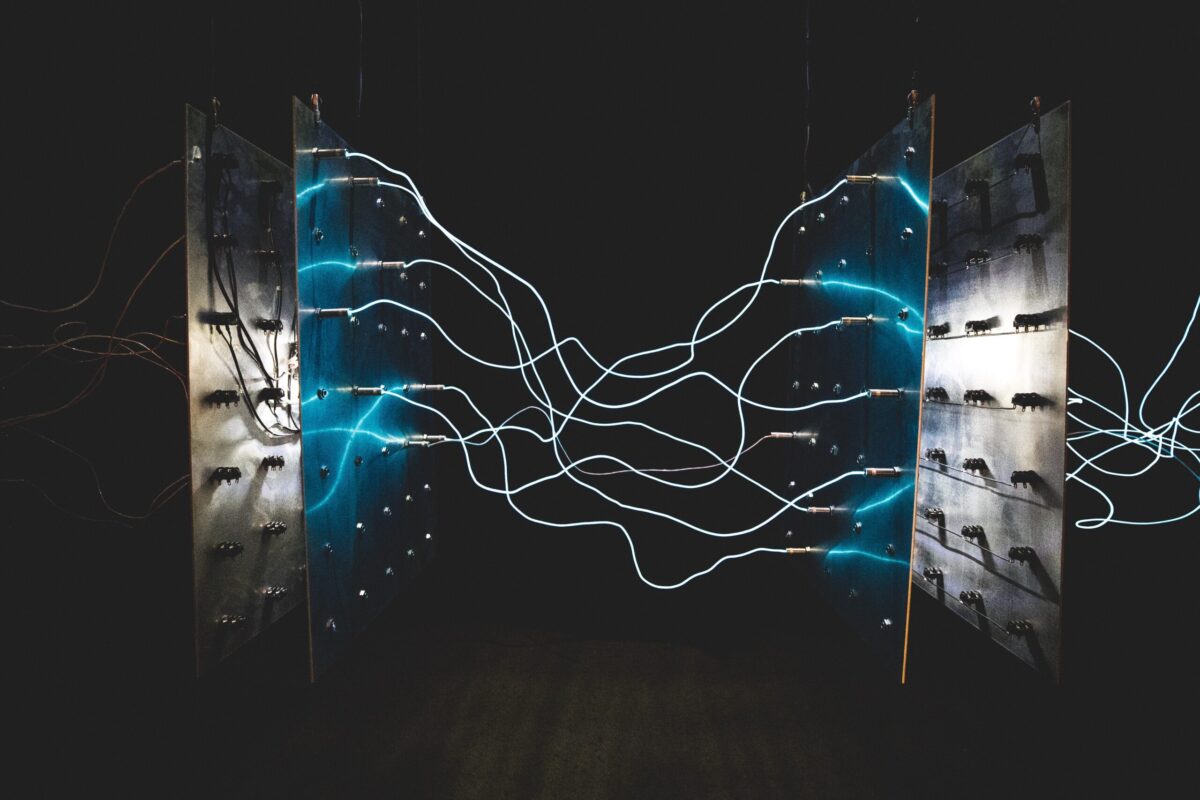 Blue electricity jumping between two connectors