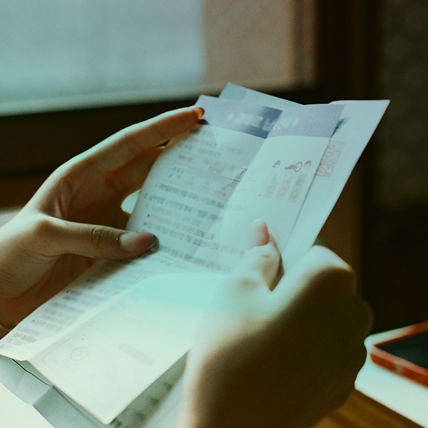 Business utility bill held in two hands